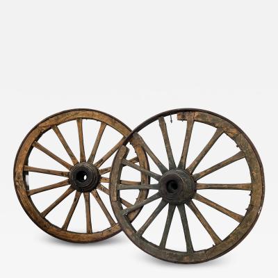 Pair of monumental wagon wheels from France