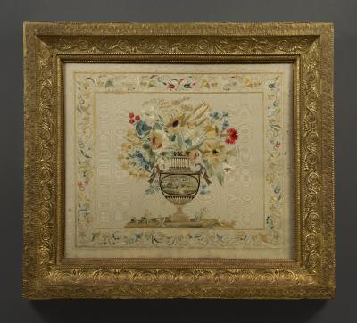 Pair of needlework panels in impressive original gilt carton pierre frames