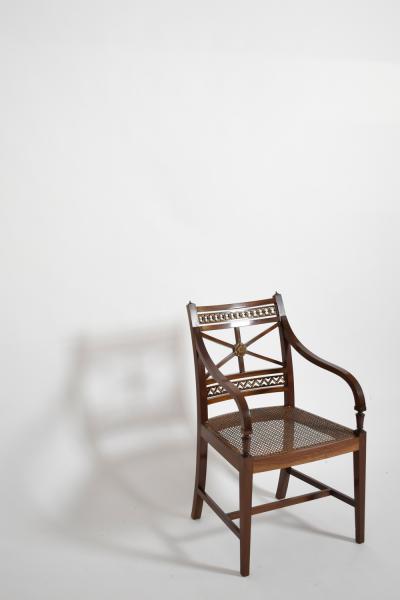 Pair of neoclassical mahogany and canning armchairs XIXth c 