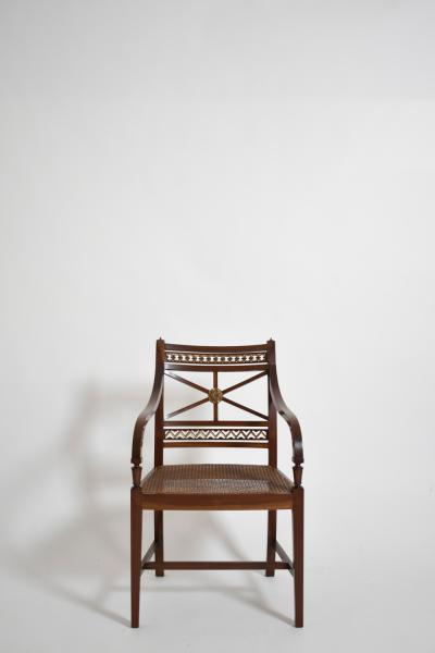 Pair of neoclassical mahogany and canning armchairs XIXth c 