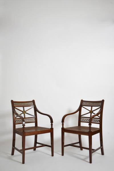 Pair of neoclassical mahogany and canning armchairs XIXth c 