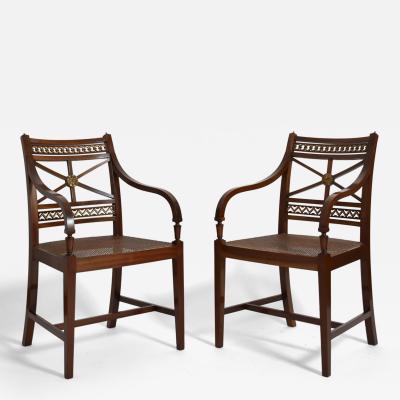 Pair of neoclassical mahogany and canning armchairs XIXth c 