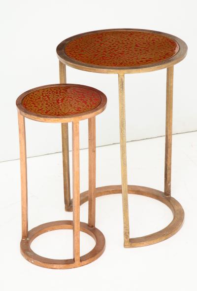 Pair of nesting tables with lacquered wood top
