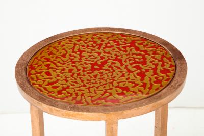 Pair of nesting tables with lacquered wood top