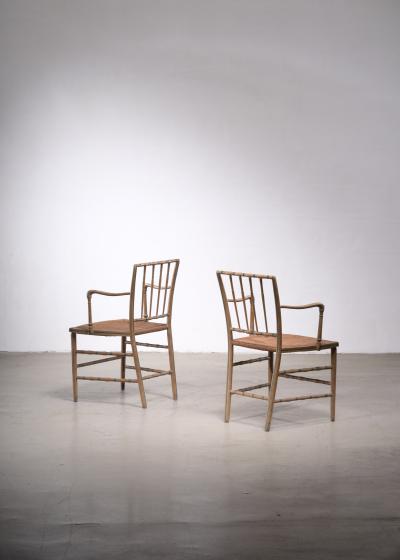 Pair of painted Sussex armchairs England 19th century