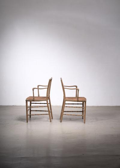 Pair of painted Sussex armchairs England 19th century