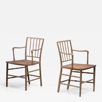 Pair of painted Sussex armchairs England 19th century