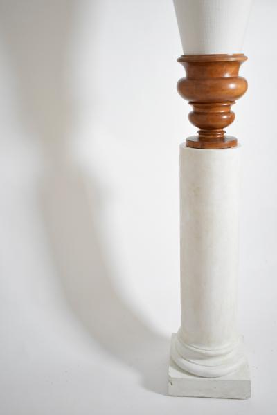 Pair of plaster columns and wooden lamps vases 