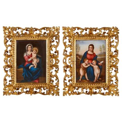 Pair of porcelain plaques in giltwood frames after Old Master Madonnas