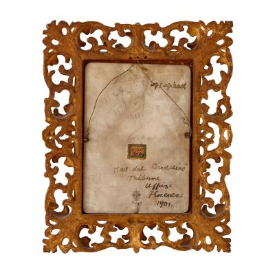 Pair of porcelain plaques in giltwood frames after Old Master Madonnas
