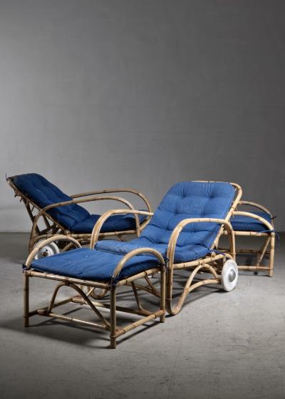 Pair of rattan lounge chairs with ottomans