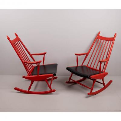 Pair of red rocking chairs