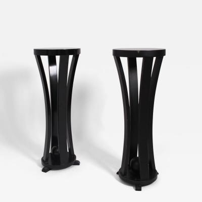 Pair of round black lacquered wooden pedestal tables 1960s 