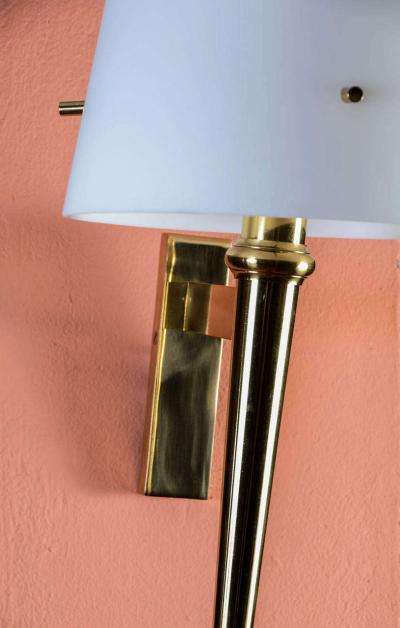 Pair of sconces in brass with glass shade