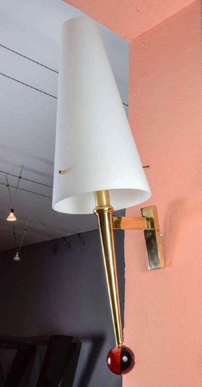 Pair of sconces in brass with glass shade