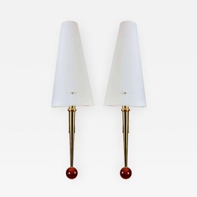 Pair of sconces in brass with glass shade