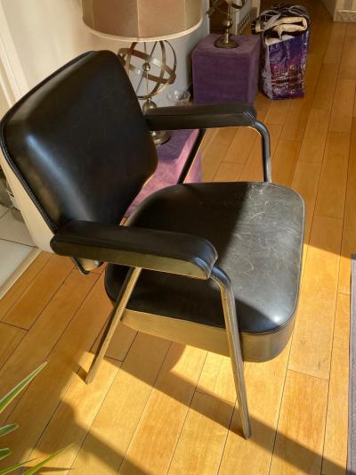 Pair of stitched Leather armchairs by Jacques Adnet