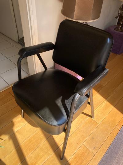 Pair of stitched Leather armchairs by Jacques Adnet