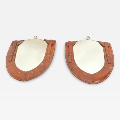 Pair of stitched leather mirrors in the style of Jacques Adnet
