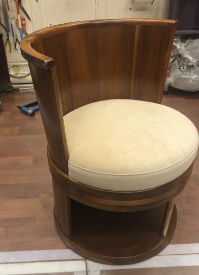 Pair of stunning French modernist barrel swivel arm chairs