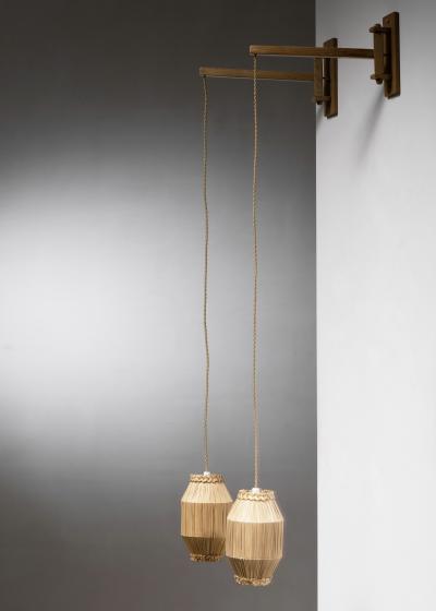 Pair of swiveling wall lamps