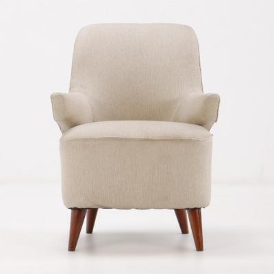 Pair of upholstered lounge chairs circa 1950 having floating arms and new fabric