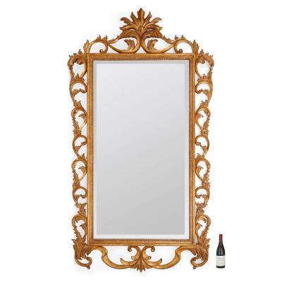 Pair of very large French giltwood mirrors with scrolled acanthus borders
