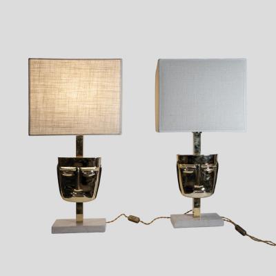 Pair of vintage brass sculpture face mask table lamps