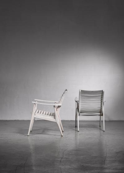 Pair of white slat chairs