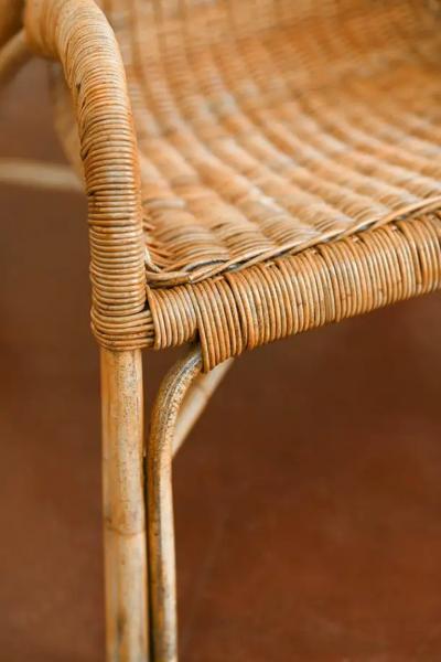 Pair of wicker armchairs with curved backrests 1980s 