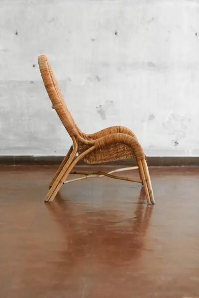 Pair of wicker armchairs with curved backrests 1980s 