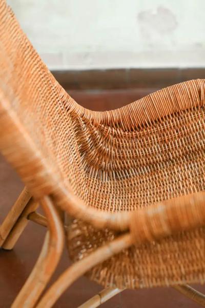 Pair of wicker armchairs with curved backrests 1980s 