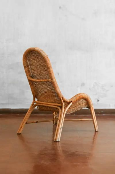 Pair of wicker armchairs with curved backrests 1980s 