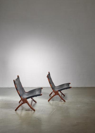 Pair of wood and leather sling chairs 1950s