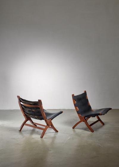 Pair of wood and leather sling chairs 1950s