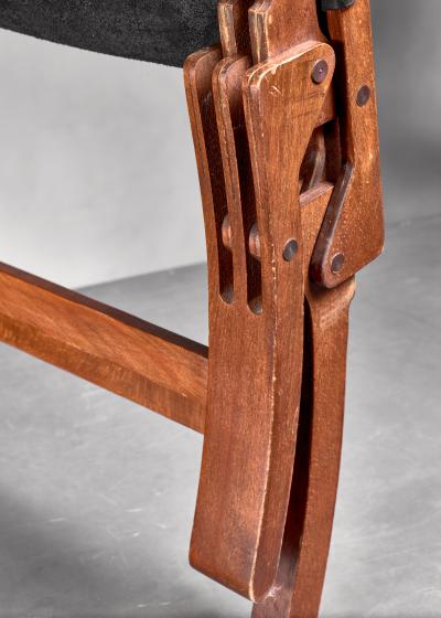 Pair of wood and leather sling chairs 1950s