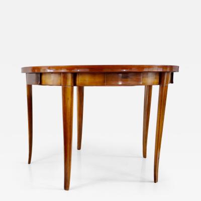 Paolo Buffa Paolo Buffa round center or game table walnut five hidden drawers 1950