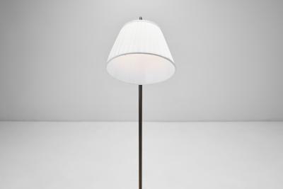 Patinated Brass Floor Lamp with Curved Neck Europe 20th century