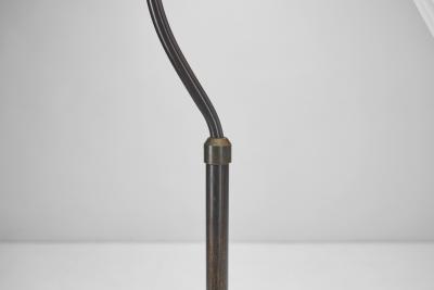 Patinated Brass Floor Lamp with Curved Neck Europe 20th century