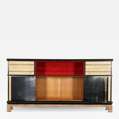 Paul Dupr Lafon IMPORTANT TAN AND RED GOATSKIN WITH LACQUERED EBONIZED WOOD CABINET ENFILADE