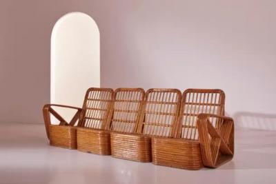 Paul Frankl A four seat rattan and fabric sectional sofa in the style of Paul Theodore Frank