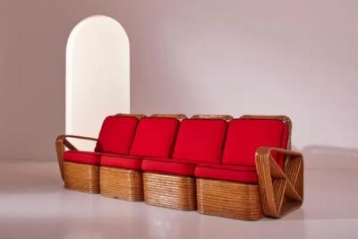Paul Frankl A four seat rattan and fabric sectional sofa in the style of Paul Theodore Frank
