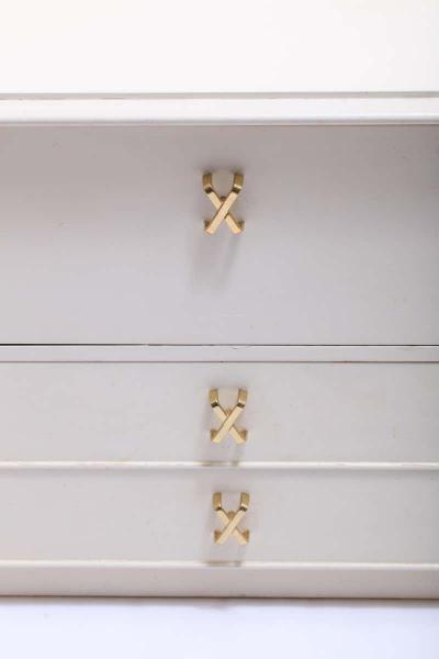 Paul Frankl Pair of Paul Frankl Ivory Lacquered Nightstands with Brass X Pulls circa 1950
