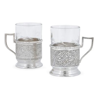 Persian engraved glass and silver part drinks service