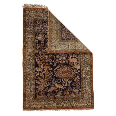 Persian woven silk Qum rug with a woodland and animal design