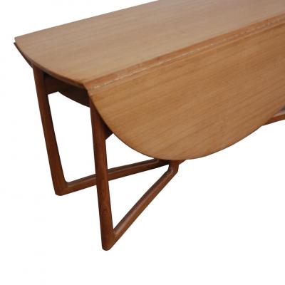 Peter Hvidt 1960s Danish Peter Hvidt Drop Leaf Dining Table in Teak and Brass