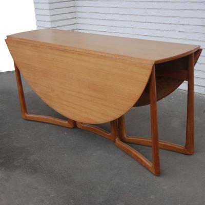 Peter Hvidt 1960s Danish Peter Hvidt Drop Leaf Dining Table in Teak and Brass