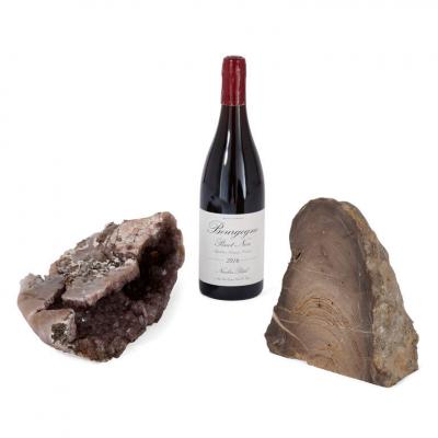 Petrified wood specimen and amethyst geode