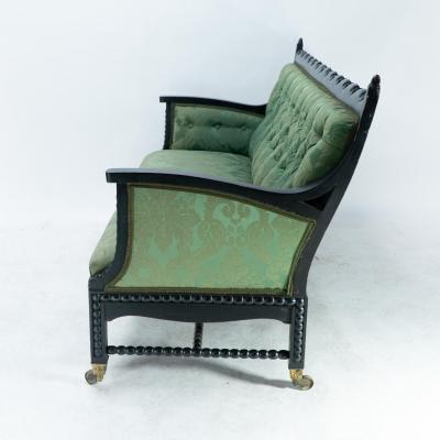 Philip Webb Philip Webb for Morris Co Aesthetic Movement Ebonised Settee with Bobbins