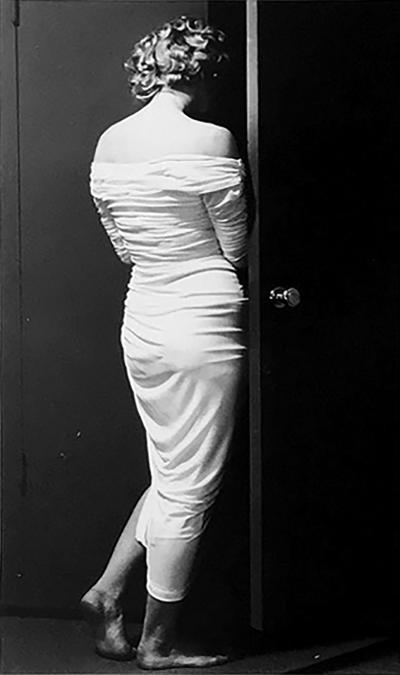 Phillipe Halsman Marilyn Entering The Closet Photograph by Phillipe Halsman